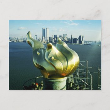 Statue Of Liberty's Flame And Manhattan Skyline Postcard by HTMimages at Zazzle