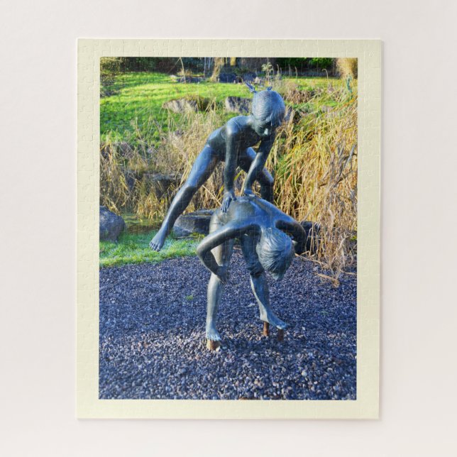 Statue of two children playing jigsaw puzzle (Vertical)