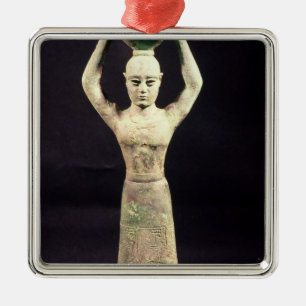 Statuette of offering bearer with votive metal ornament