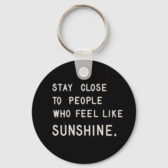 Stay close to people who feel like sunshine keychain (Front)