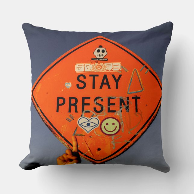 Stay Present, Orange Road Sign Graffiti Throw Pillow (Front)