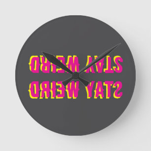 Stay Weird Backwards – Pink Black Yellow Round Clock