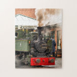 STEAM TRAINS JIGSAW PUZZLE<br><div class="desc">Wales, the land of the little steam trains. These little Welsh steam trains were mainly used originally for hauling slate from the quarries..These beautiful little green steam trains from the Talyllyn Railway, with steam and smoke billowing, are a fine example of British historical engineering, all brought to life with Zazzle's...</div>