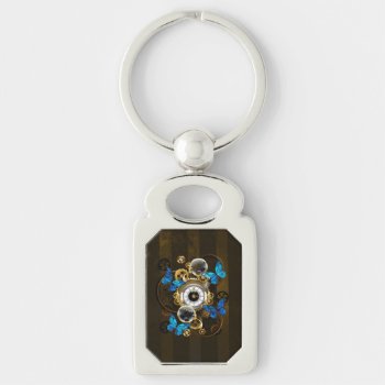 Steampunk Gears And Blue Butterflies Keychain by Blackmoon9 at Zazzle