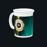 Steampunk Jewelry Watch on a Green Background Beverage Pitcher<br><div class="desc">Jewelry, gold watch with a gold chain and keys on a green textural background. Steampunk style.</div>