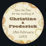 Steampunk Wedding, round save the date sticker<br><div class="desc">COPYING OR PRINTING THIS WORK ELSEWHERE IS A BREACH OF MY INTELLECTUAL PROPERTY RIGHTS AND IS EXPRESSLY FORBIDDEN! USE THE CUSTOMIZE IT BUTTON TO CHANGE TEXTS/COLORS! A vintage piece of parchment and bordered by cogs and gears. Available as wedding invitations, engagement invitations, save the date announcements, RSVPs, reception menus and...</div>