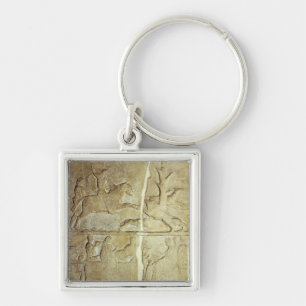 Stela relief depicting a wild boar hunt keychain
