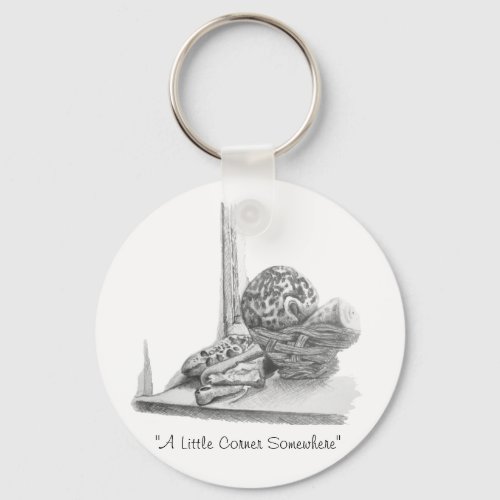 Still life picture of shells and pebbles keychain