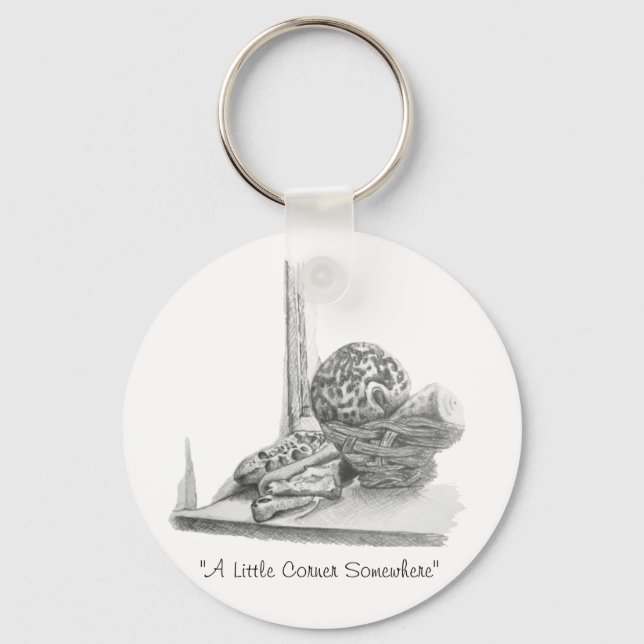 Still life picture of shells and pebbles keychain (Front)