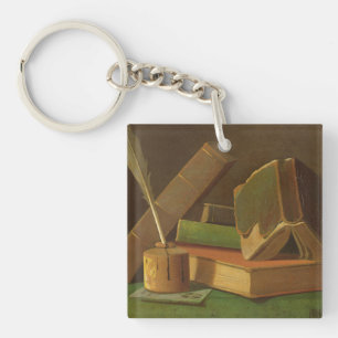 Still life with books and ink well keychain