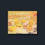 Still Life with French Novels | Vincent van Gogh Canvas Print<br><div class="desc">Still Life with French Novels and Glass with a Rose (1887) by Dutch post-impressionist artist Vincent Van Gogh. Original artwork is an oil on canvas depicting an stacks of books in warm yellow tones.

Use the design tools to add custom text or personalize the image.</div>