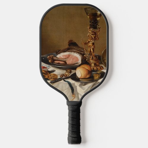 Still life with ham books and ornamental vessels  pickleball paddle