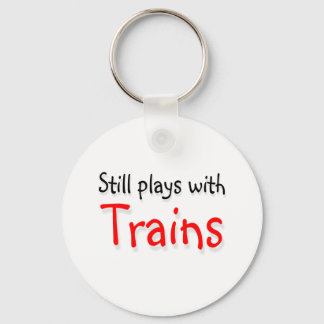 Still plays with trains keychain