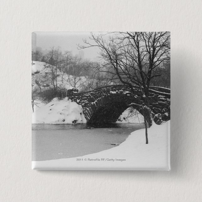 Stone bridge over snow covered river pinback button (Front)