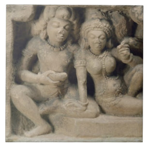 Stone carving of lovers enjoying a dance performan ceramic tile