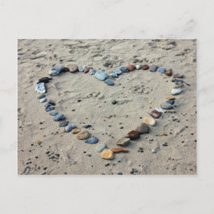 Stone heart in sand postcard