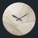 Stone Quiet — Minimalist Embossed Numeral Large Clock<br><div class="desc">Stone Quiet is a refined, neutral wall clock artwork designed for calm, modern interiors. Soft layers of pale stone and warm ivory create an organic, abstract surface that feels both grounded and airy. The numerals are gently embossed through tonal contrast rather than hard outlines, allowing them to remain legible while...</div>