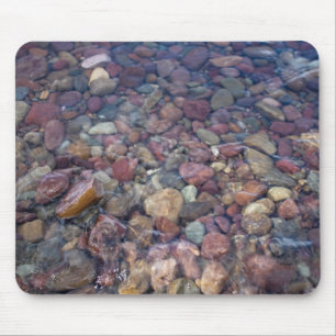 Stones in the lake at Glacier National Park Mouse Pad