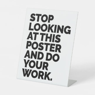 Stop looking at this poster and do your work pedestal sign