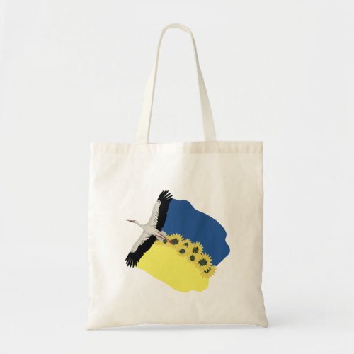 Stork carries a Ukrainian flag on its wings Tote Bag