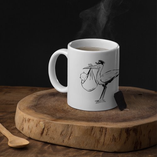 Stork Holding A Baby Mug