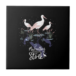 Stork Humor: 'My Feather Keeps Me Stork' Ceramic Tile