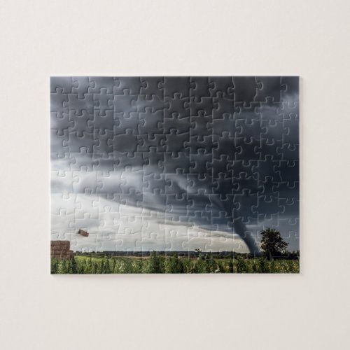 Storm tornado or twister lifing hay in bad weather jigsaw puzzle