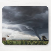 Storm tornado or twister lifing hay in bad weather