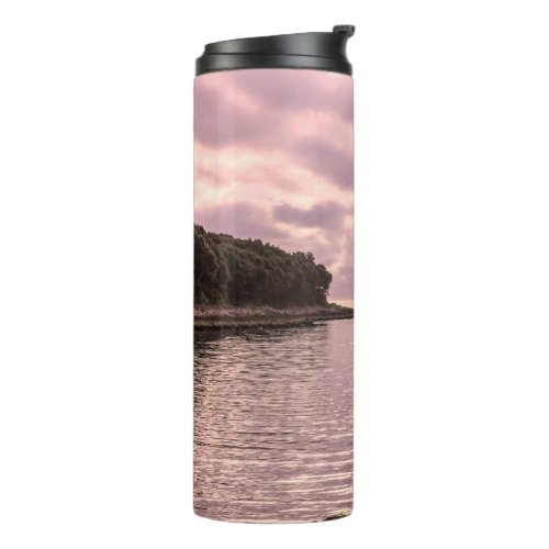 stormy sky and reflections on the placid sea therm thermal tumbler