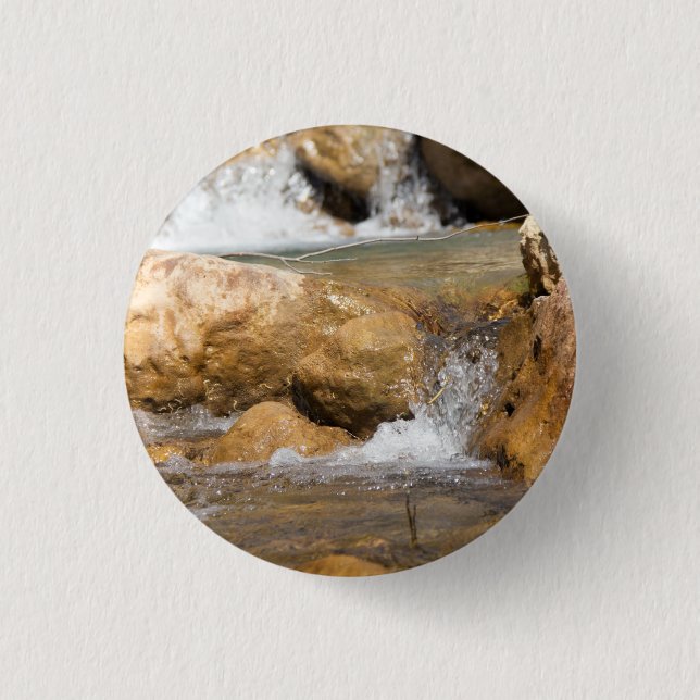 Stormy stream in spring button (Front)