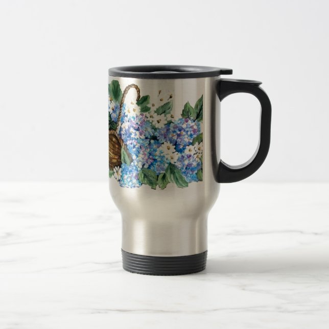 Straw basket with blue hydrangeas and white little travel mug (Right)