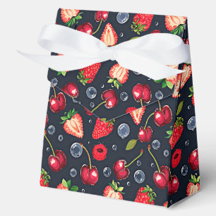 Strawberries and cherries on a dark background favor boxes