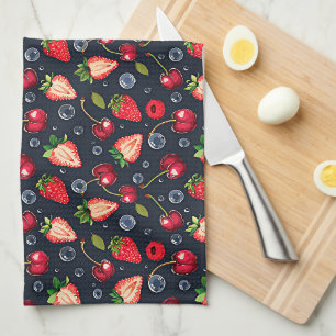 Strawberries and cherries on a dark background kitchen towel