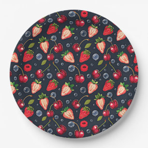 Strawberries and cherries on a dark background paper plates
