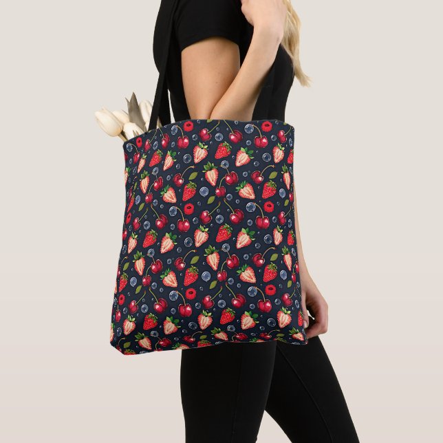 Strawberries and cherries on a dark background   tote bag (Close Up)