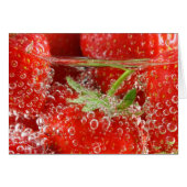 Strawberries in water close up (Front Horizontal)