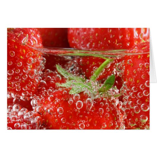 Strawberries in water close up (Front Horizontal)