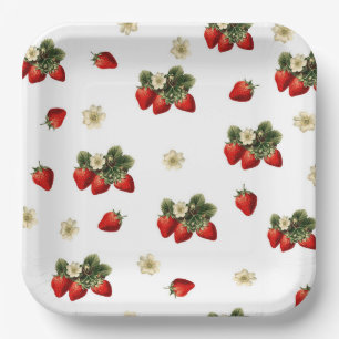 Strawberry paper plates with blossoms on white