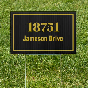 Street address house number black and gold sign