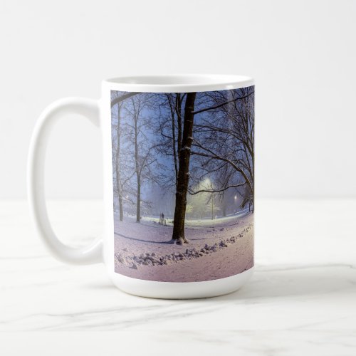 Street lights and covered in snow trees coffee mug