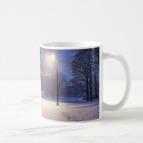 Street lights and covered in snow trees coffee mug