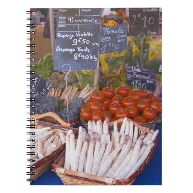 Street market merchant's stall with white notebook (Front)