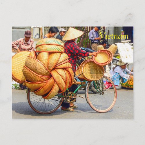 Street vendor on bicycle selling basketware postcard