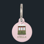 STREETCAR (PINK) PET ID TAG<br><div class="desc">Add a dash of New Orleans charm to your pet's collar with our Louisiana Streetcar Pet ID Tag. This tag pays homage to the Big Easy's historic streetcars, capturing the essence of NOLA's vibrant street scenes. The pastel pink backdrop complements the streetcar design, while the sample name 'STELLA' is stylishly...</div>