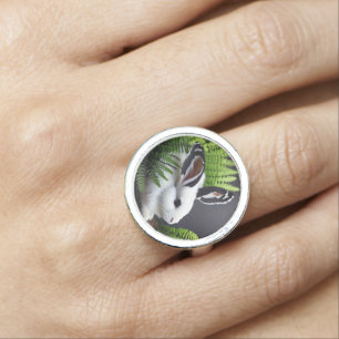 Striking Contrast: The White Bunny with Black Ears Ring