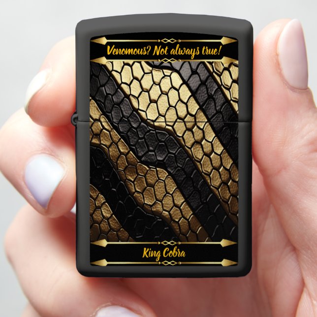 Striking patterns of a black and gold snake skin zippo lighter (In Hand)