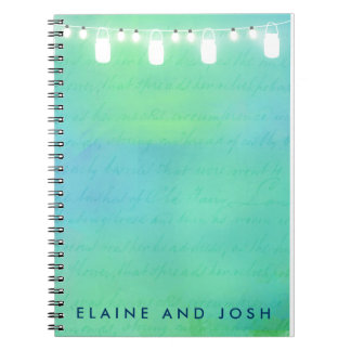 String lights and mason jars in blue green notebook