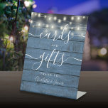 String Lights Blue Wood Script Cards And Gifts Pedestal Sign<br><div class="desc">Featuring pretty string lights on a blue rustic wood background,  this elegant cards and gifts sign is perfect for all celebrations. Designed by Thisisnotme©</div>