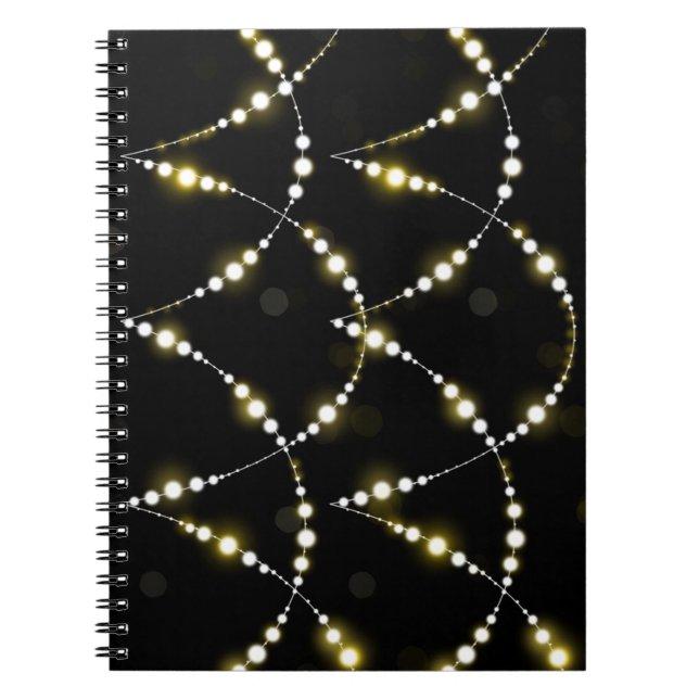 String of Glowing Lights on Black Notebook (Front)