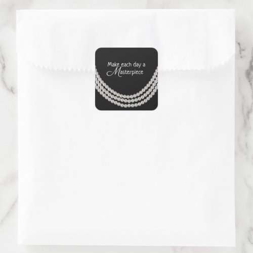 string of pearls on black with quote square sticker